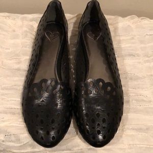 Black Flats, with lacy cutout design. New
